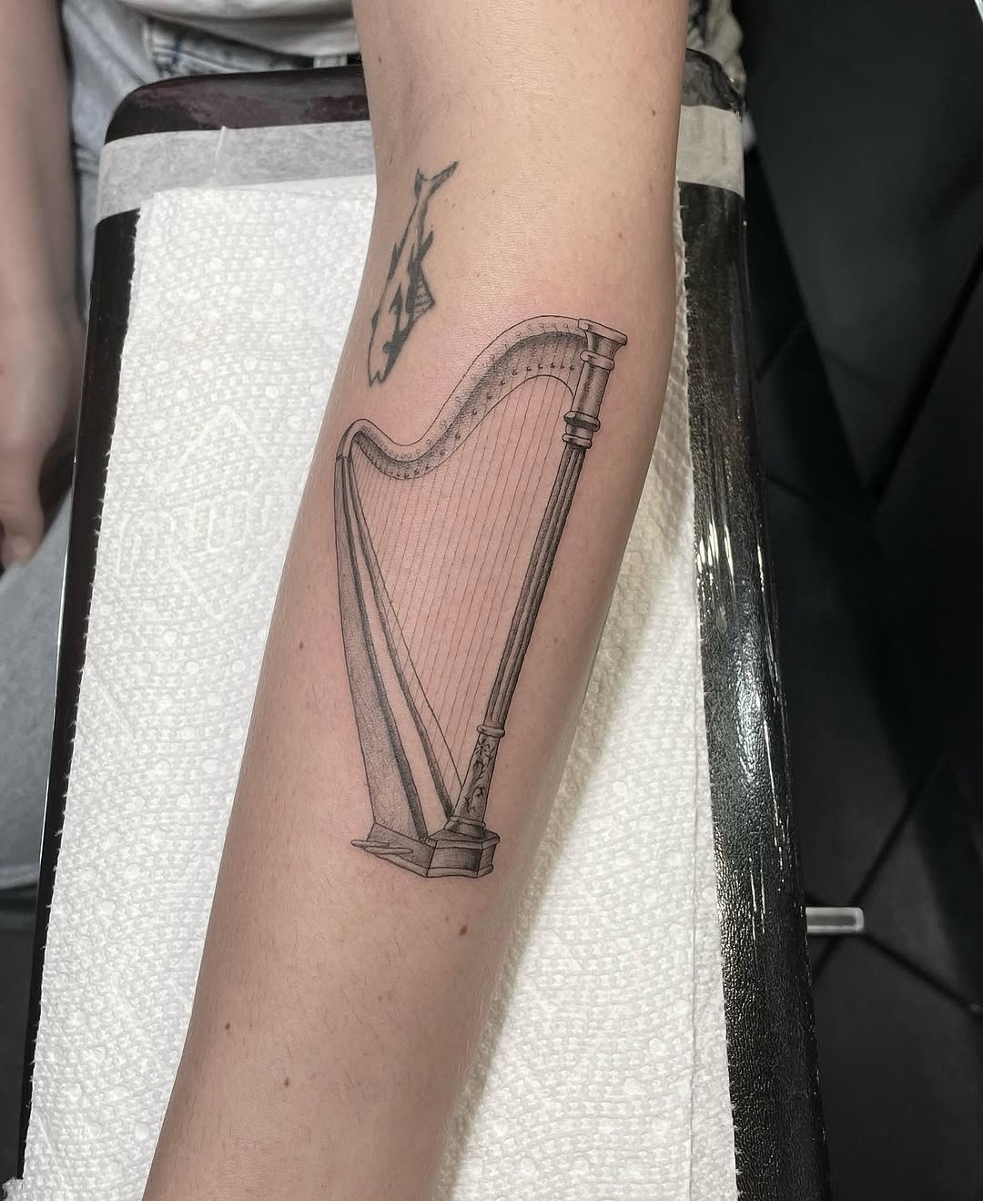 Tattoo by @fantasyandfuntattoo — black_and_grey, realism