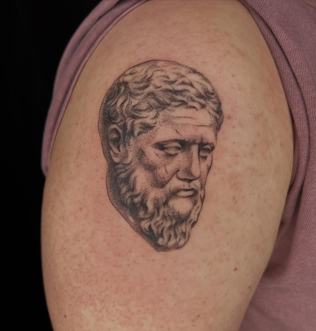 Tattoo by @velvet.snails — realism, black_and_grey
