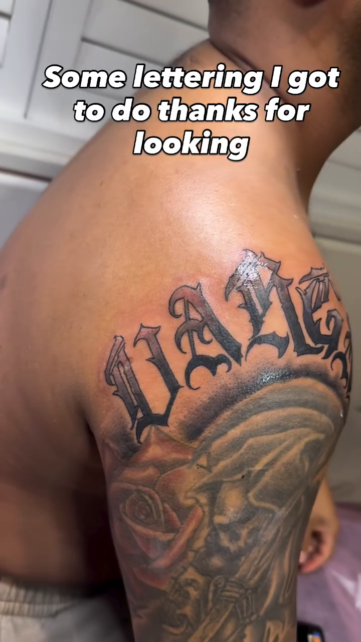 Tattoo by @toplisstattoos โ lettering_script, black_and_grey