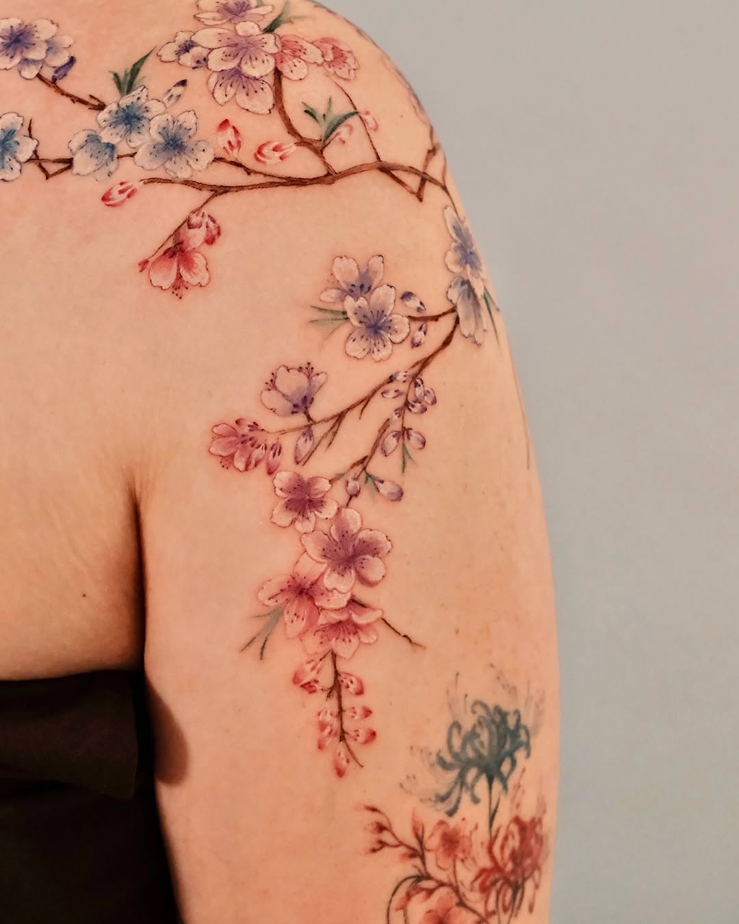 Tattoo by @mika.z.tattoo — watercolor, fine_line
