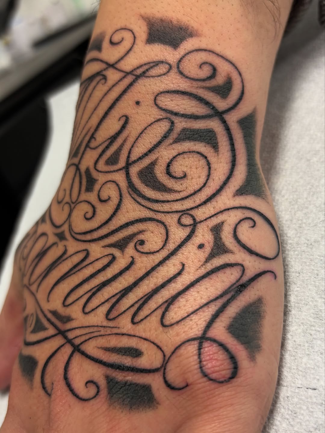 Tattoo by @t4no_one — lettering_script, blackwork