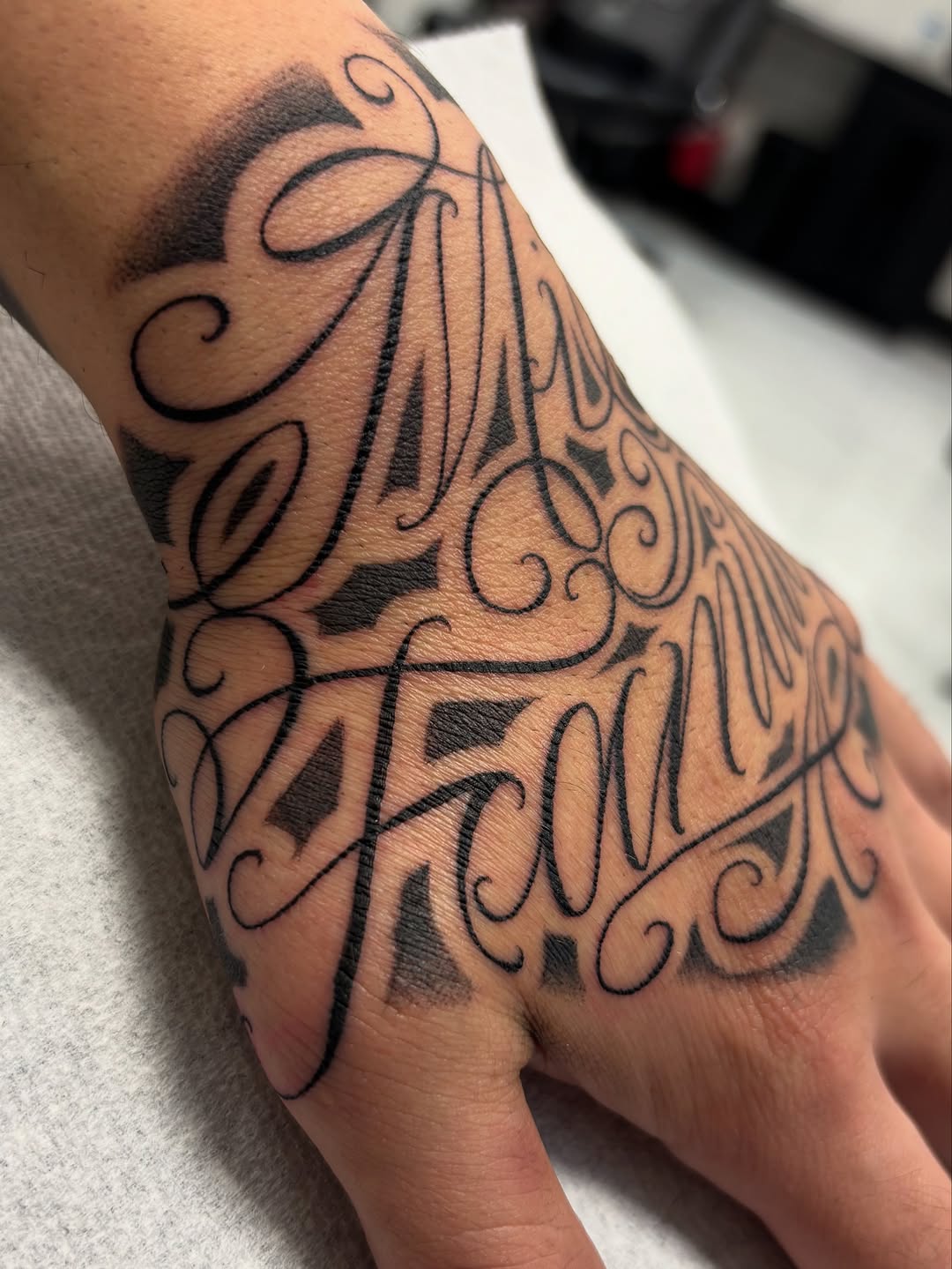 Tattoo by @t4no_one — lettering_script, blackwork