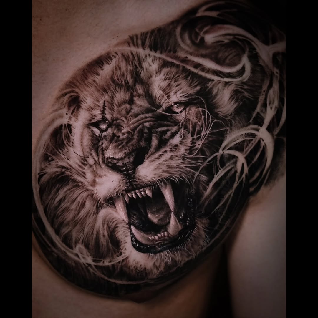 Tattoo by @tattooist_pitasso — realism, black_and_grey