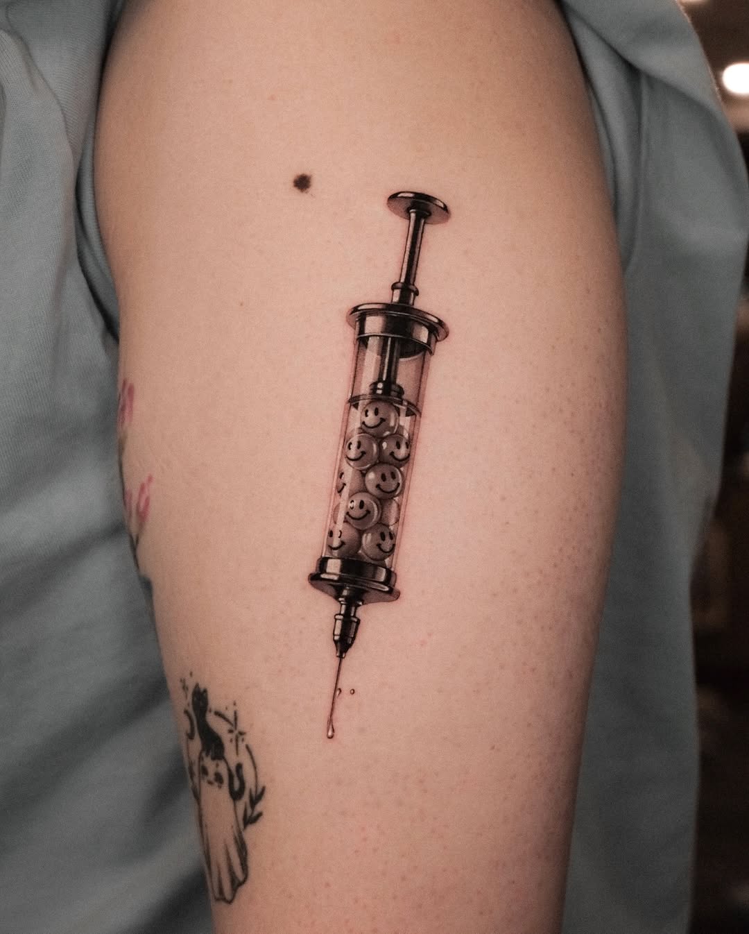 Tattoo by @dionne.tattoo โ realism, black_and_grey