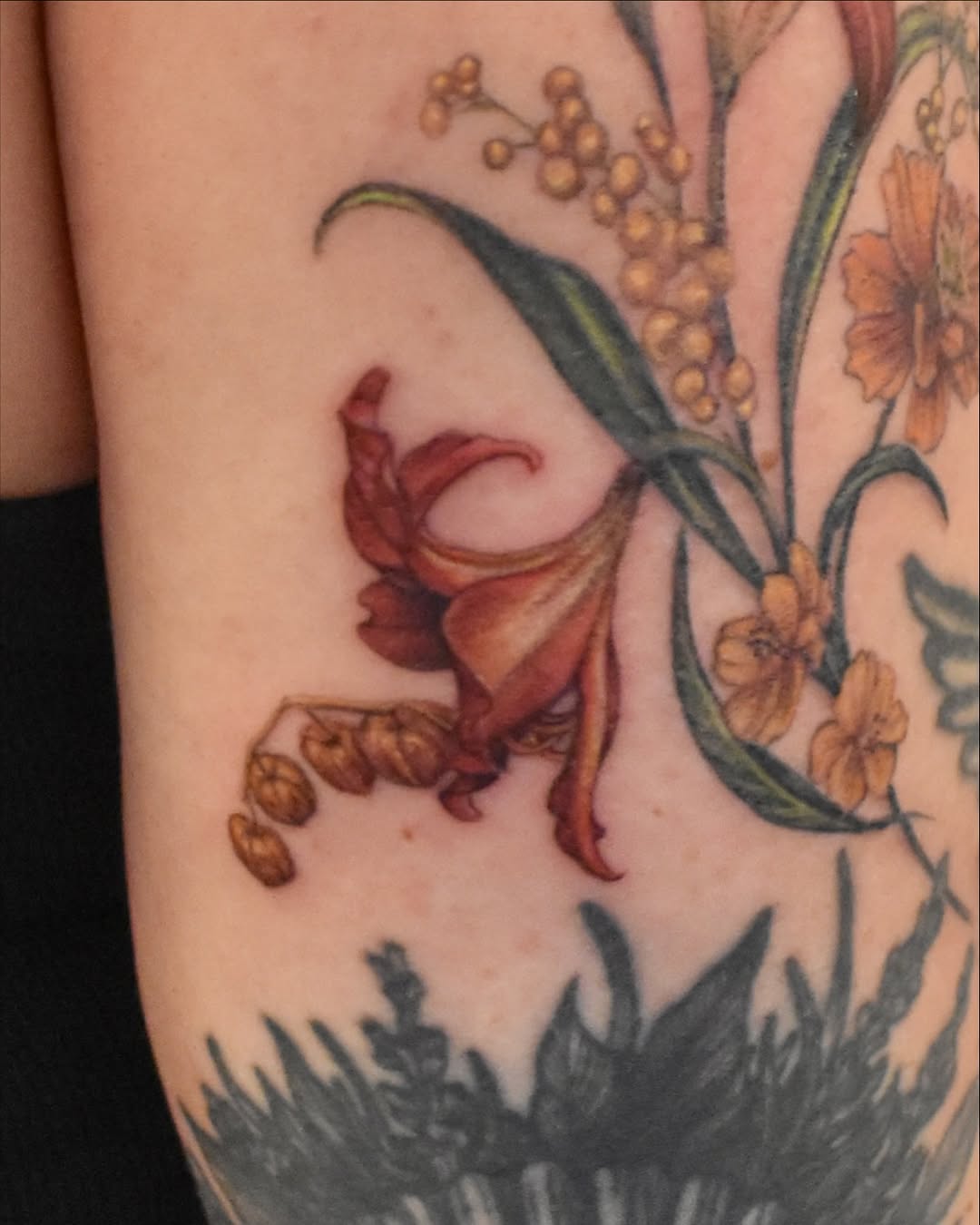 Tattoo by @laurence.t.l — realism, botanical