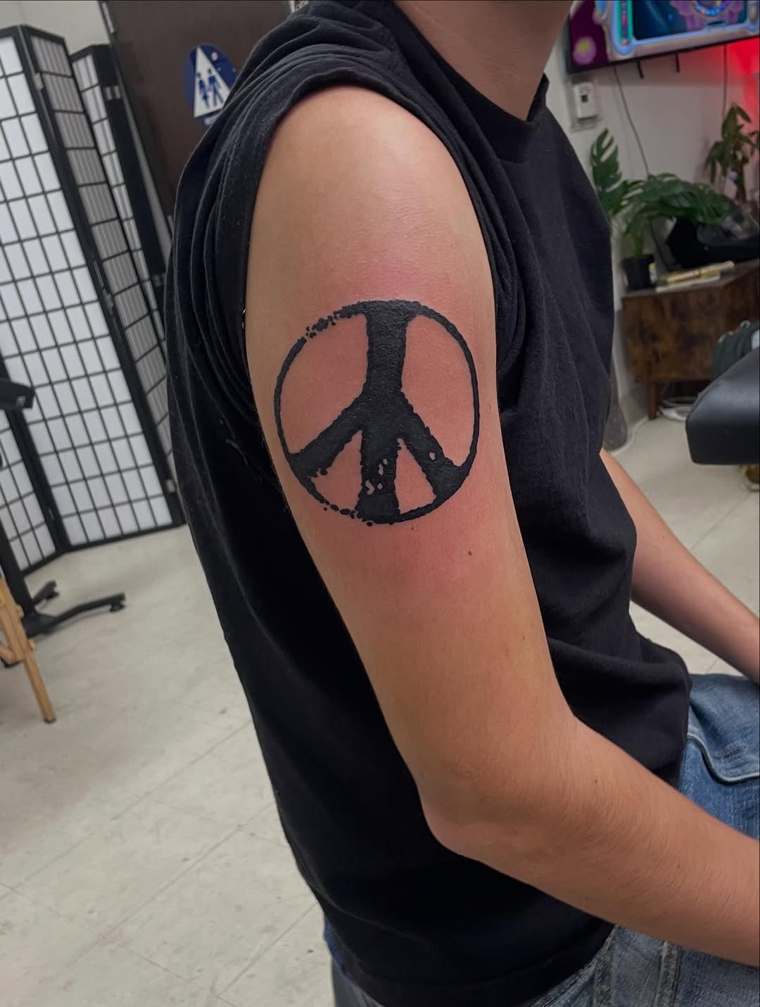 Tattoo by @emotionalthugtattoo — blackwork
