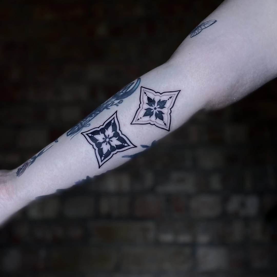 Tattoo by @tatemarthatattoo — geometric, blackwork