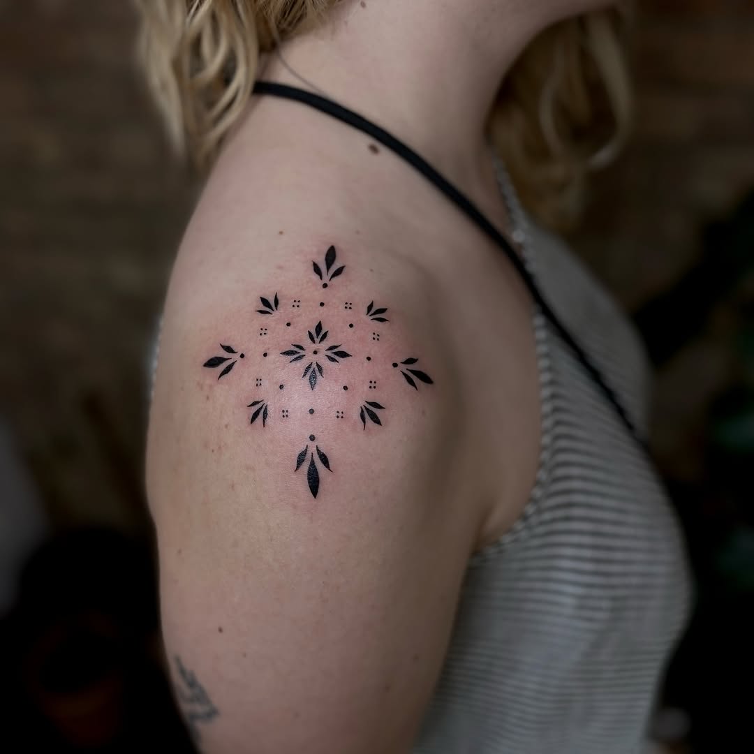 Tattoo by @tatemarthatattoo — geometric, dotwork