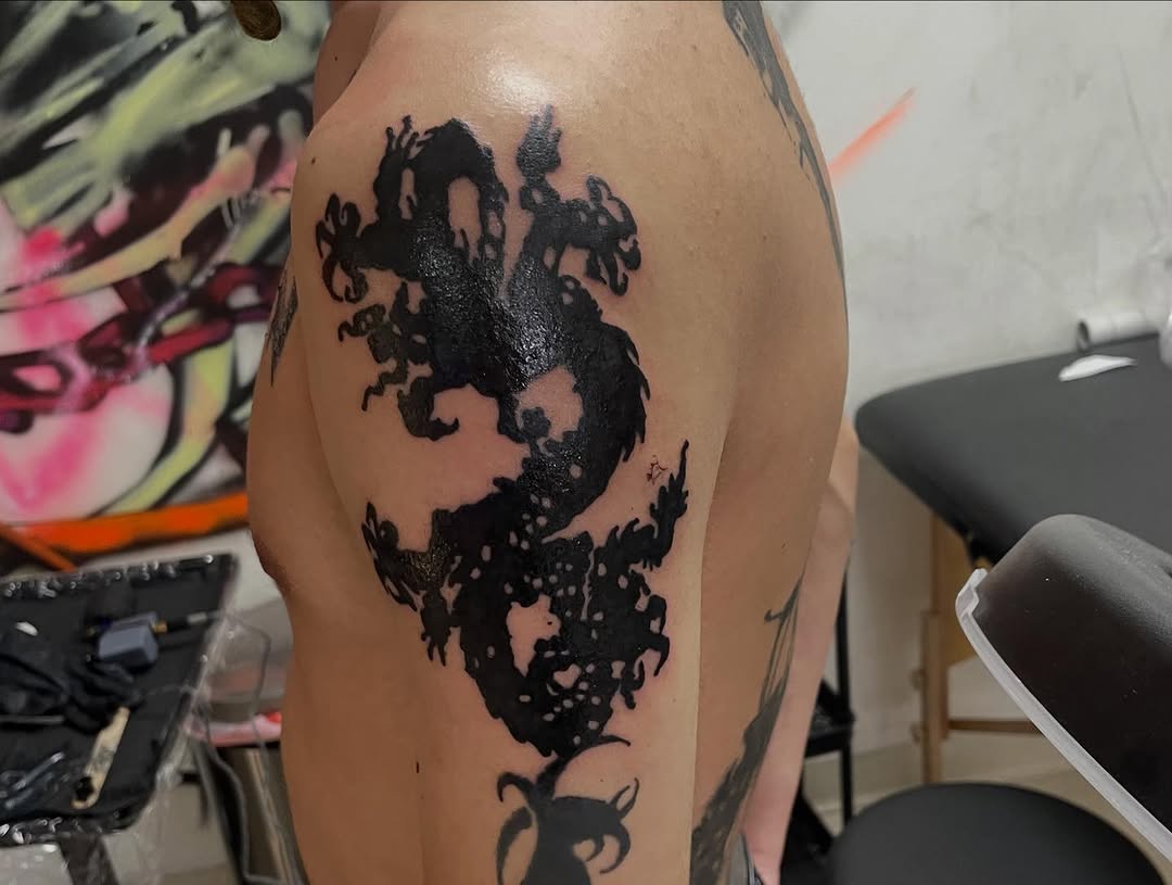 Tattoo by @emotionalthugtattoo — blackwork