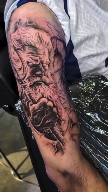 Tattoo by @drewk6203 — black_and_grey, realism
