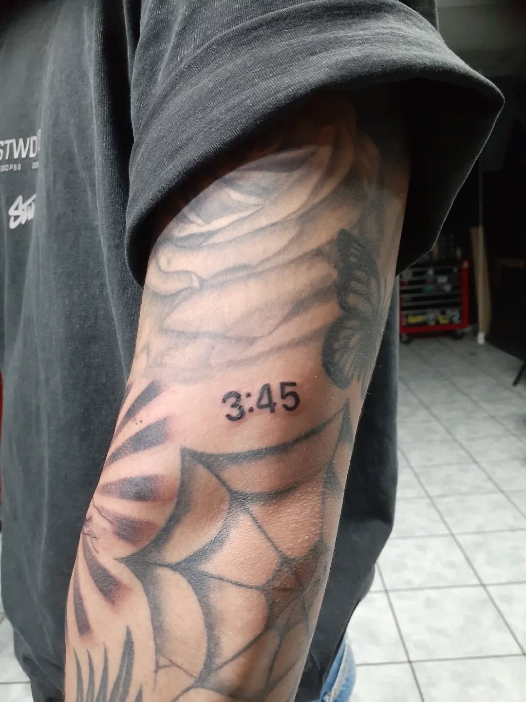 Tattoo by @alvinlouceltattooer — lettering_script, black_and_grey
