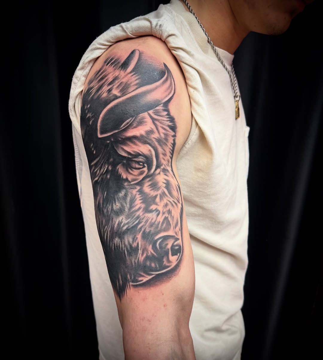 Tattoo by @inkplug__higherlevel — realism, black_and_grey