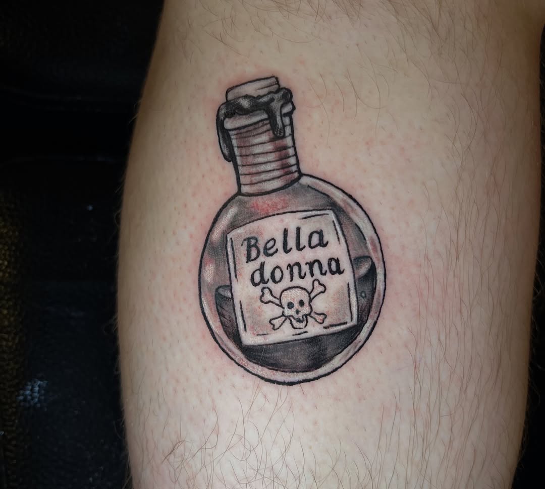 Tattoo by @lizpavtattoos — black_and_grey, lettering_script