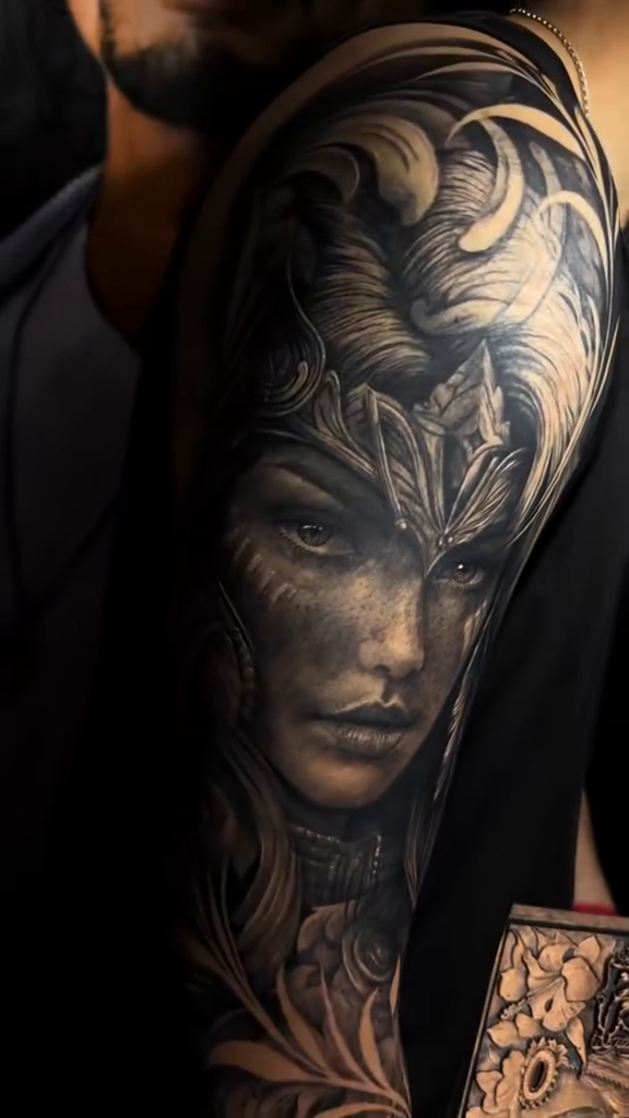 Tattoo by @elmertattoo1 β realism, black_and_grey