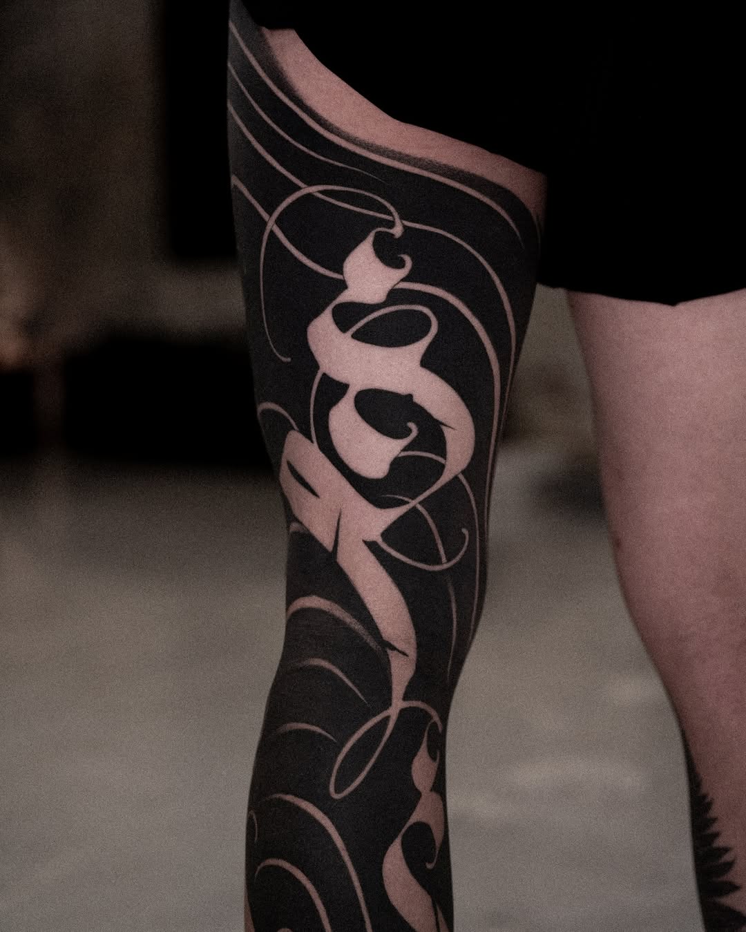 Tattoo by @low.original — blackwork, lettering_script