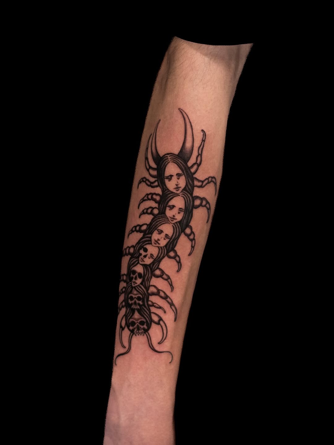 Tattoo by @wenghiskhan_tattoos — dark_realism, black_and_grey