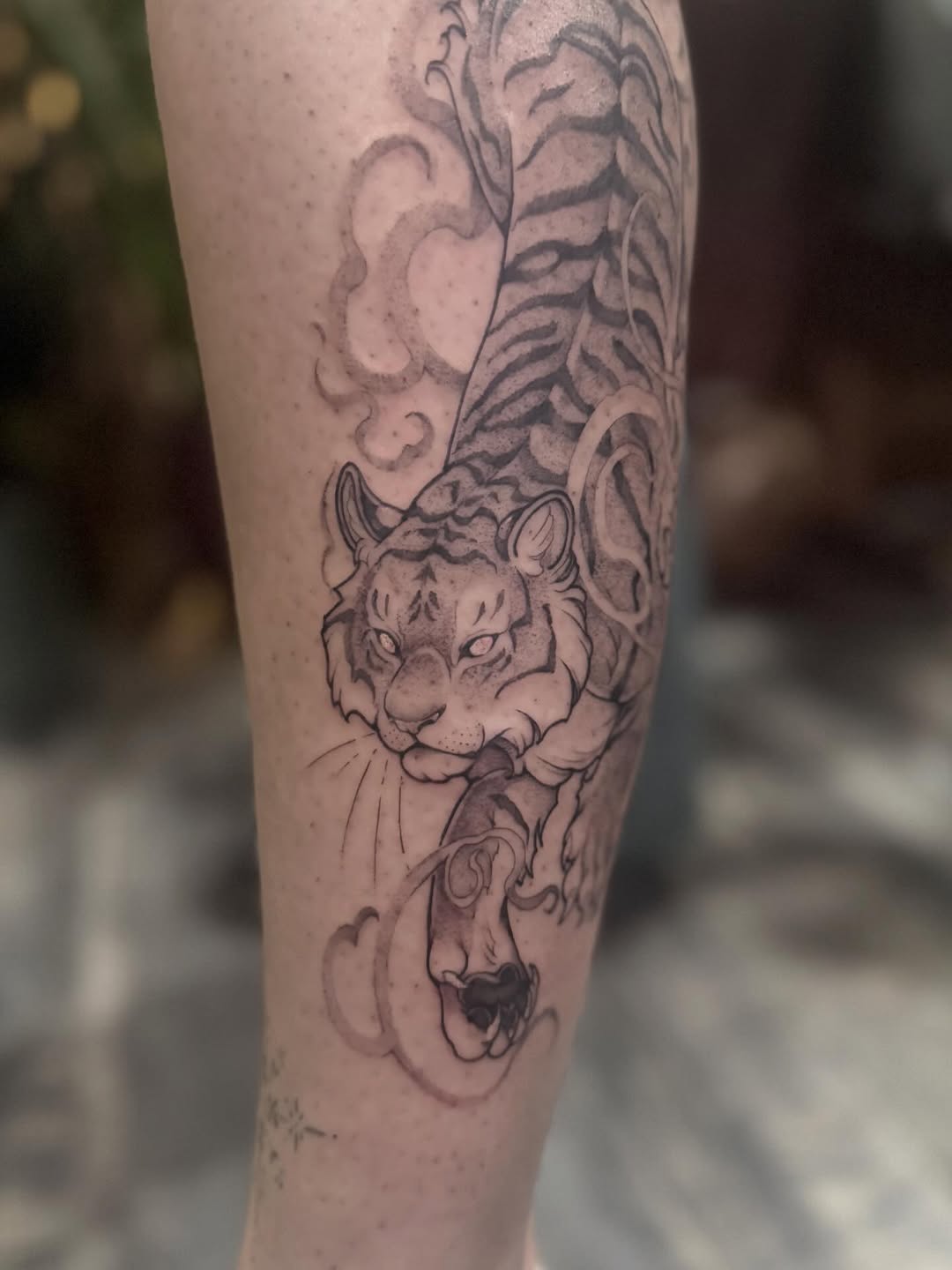 Tattoo by @pixi.bite — black_and_grey, realism