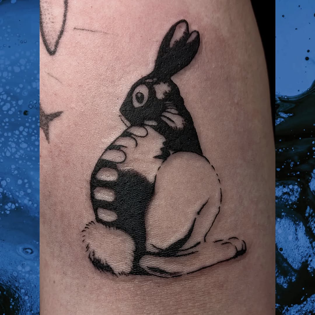 Tattoo by @crappie.tatts — illustrative, blackwork