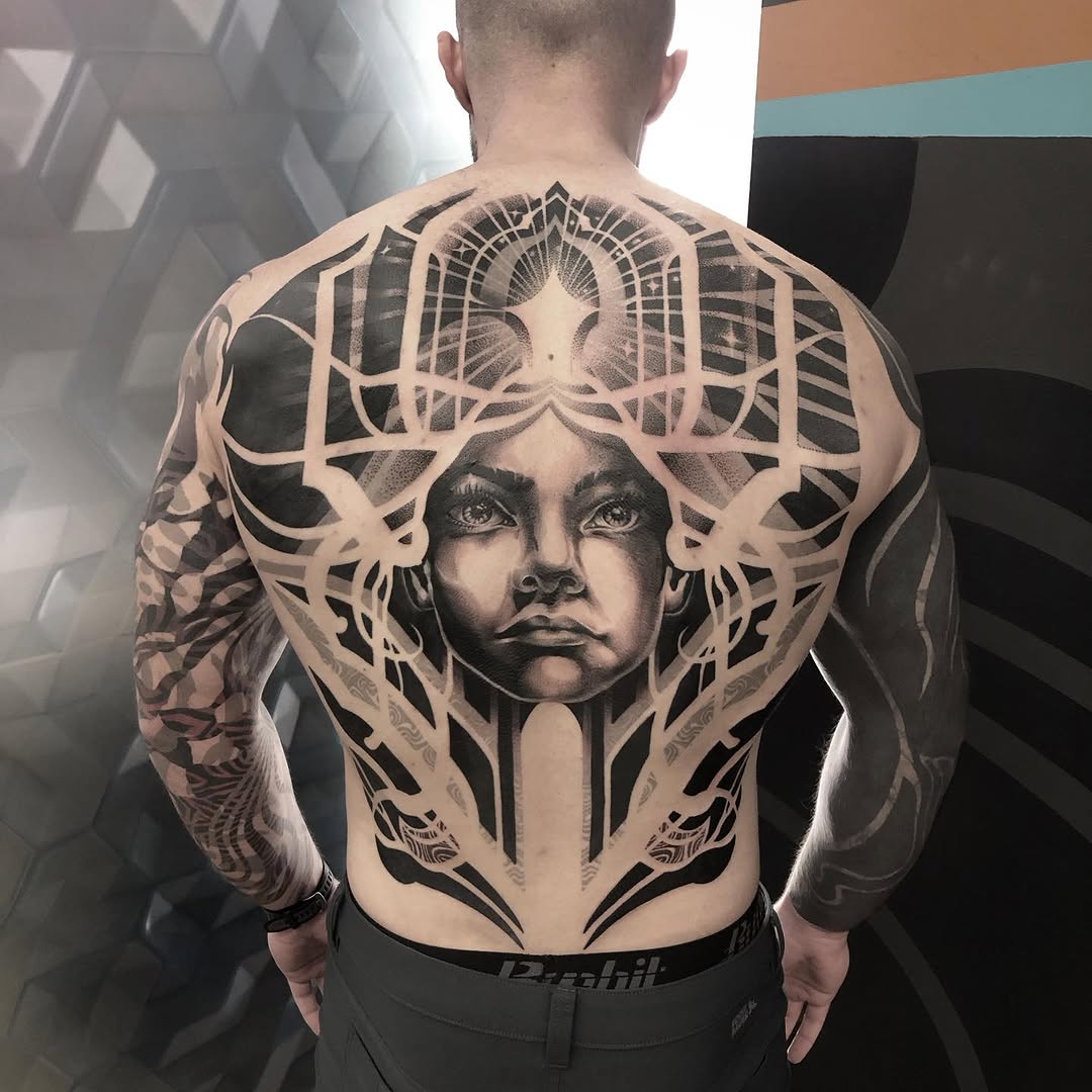 Tattoo by @golden.spiral.lola — black_and_grey, realism