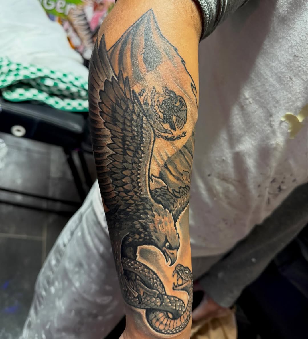 Tattoo by @barbedwireinktattoos โ realism, black_and_grey