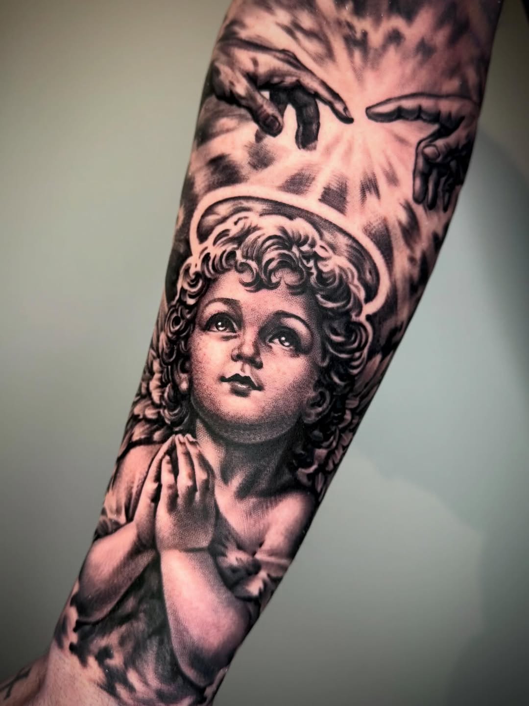 Tattoo by @tatts_by_t โ realism, black_and_grey