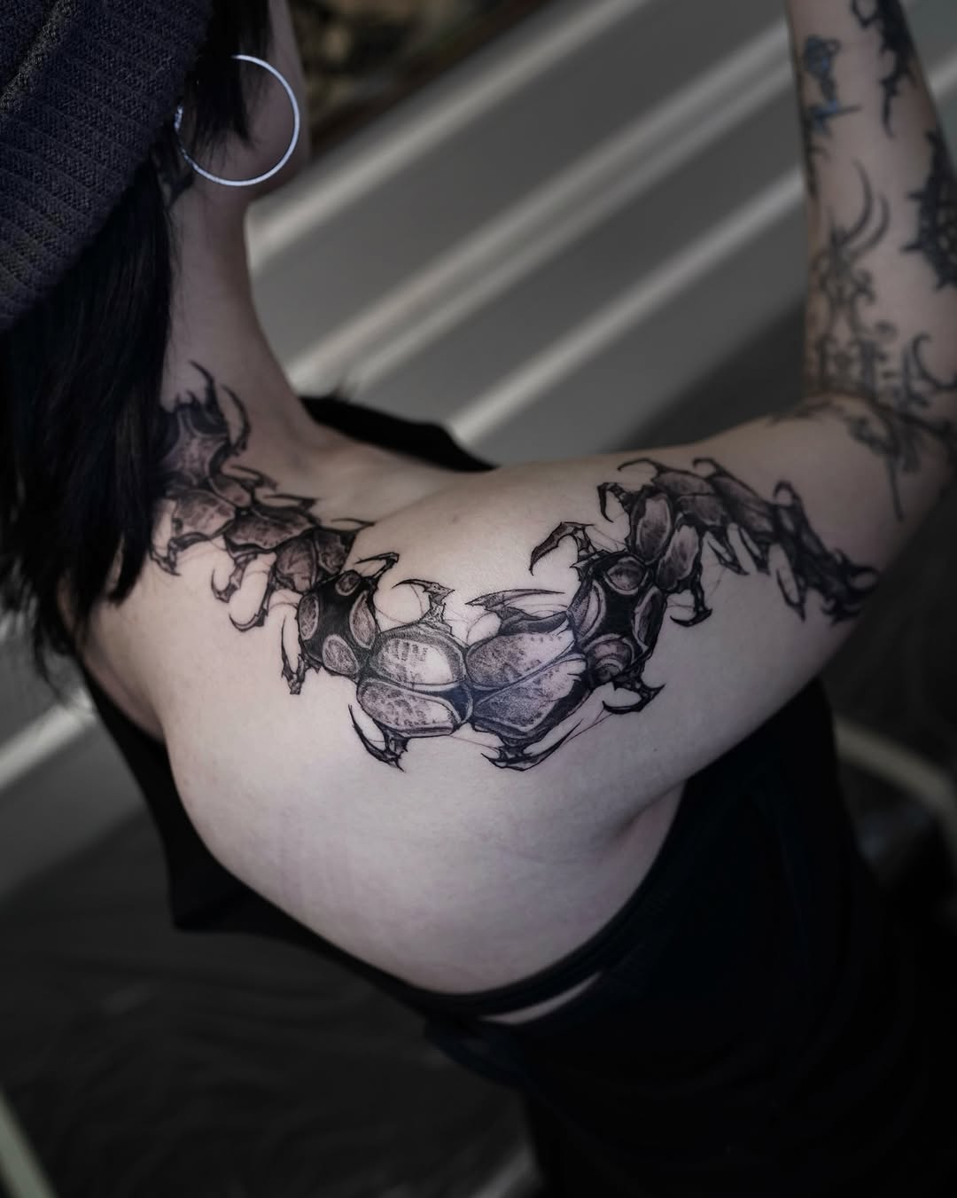 Tattoo by @gun_tattooist — black_and_grey, illustrative