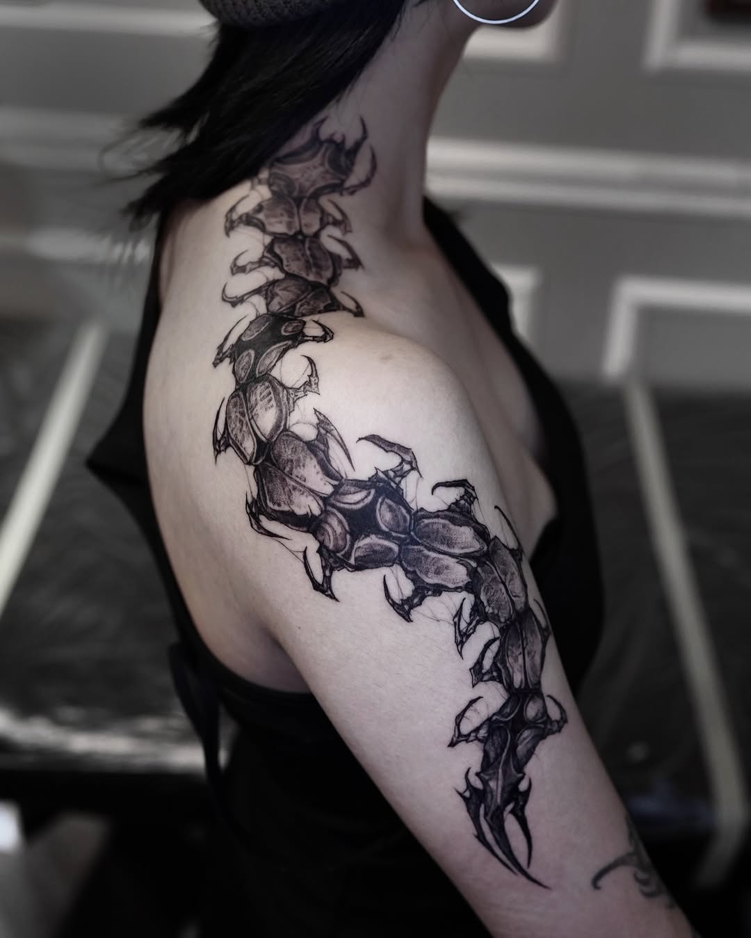 Tattoo by @gun_tattooist — blackwork, dark_realism