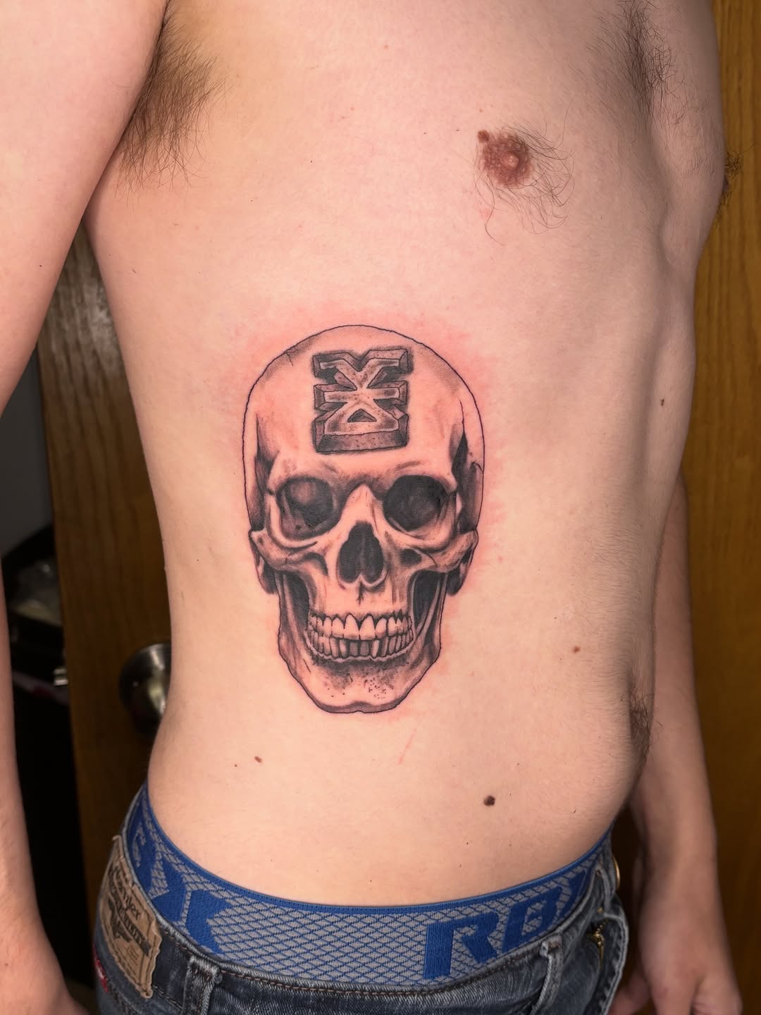 Tattoo by @kyshae.tattoos — realism, black_and_grey