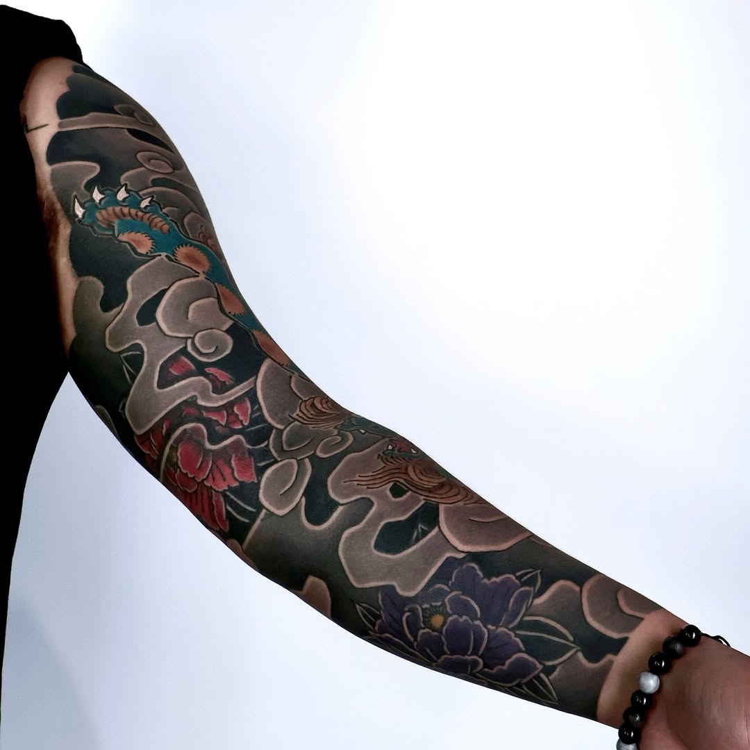 Tattoo by @noir_by_jm — japanese_irezumi, black_and_grey