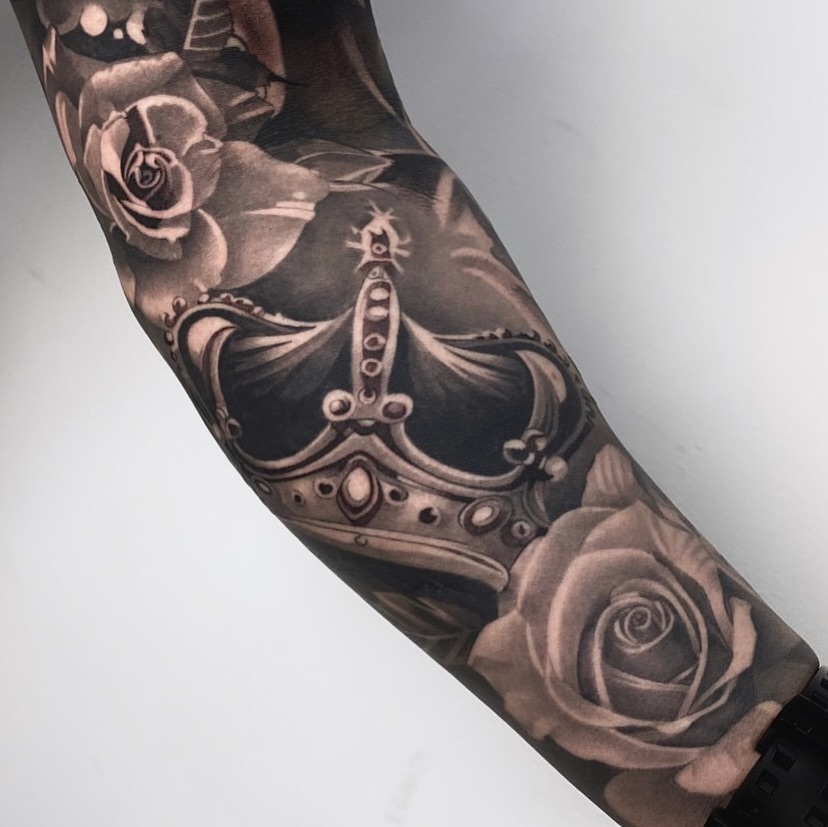 Tattoo by @vudi_tattoo — realism, black_and_grey