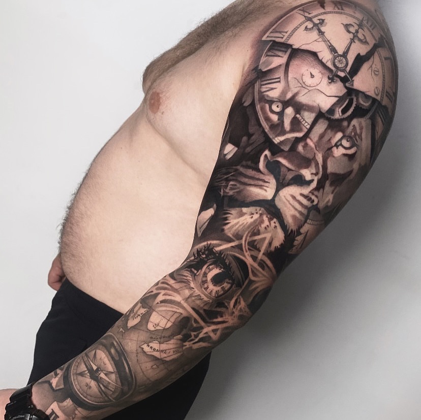 Tattoo by @vudi_tattoo — realism, black_and_grey