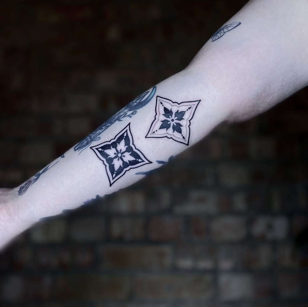 Tattoo by @tatemarthatattoo — geometric, blackwork
