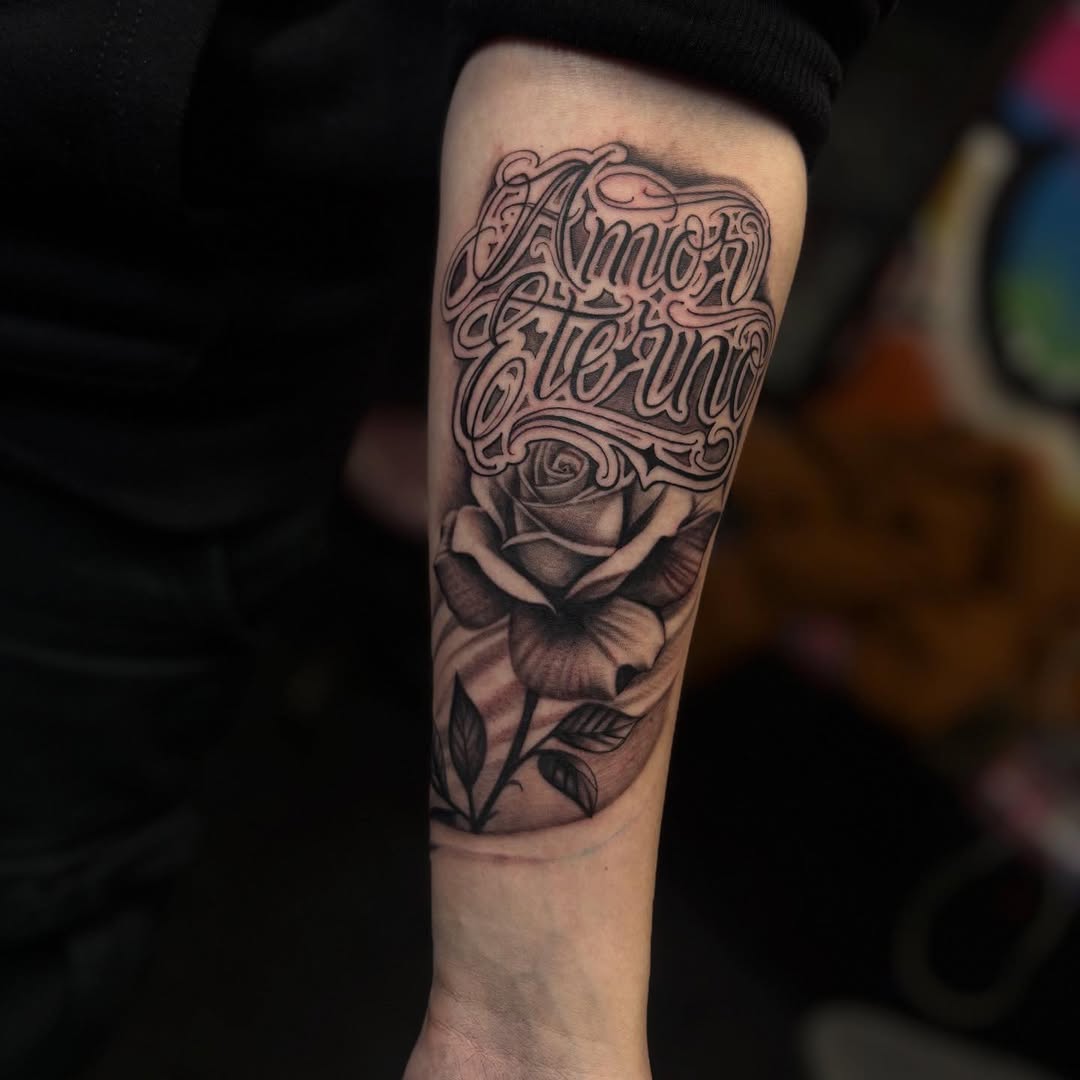 Tattoo by @young.inks — lettering_script, black_and_grey