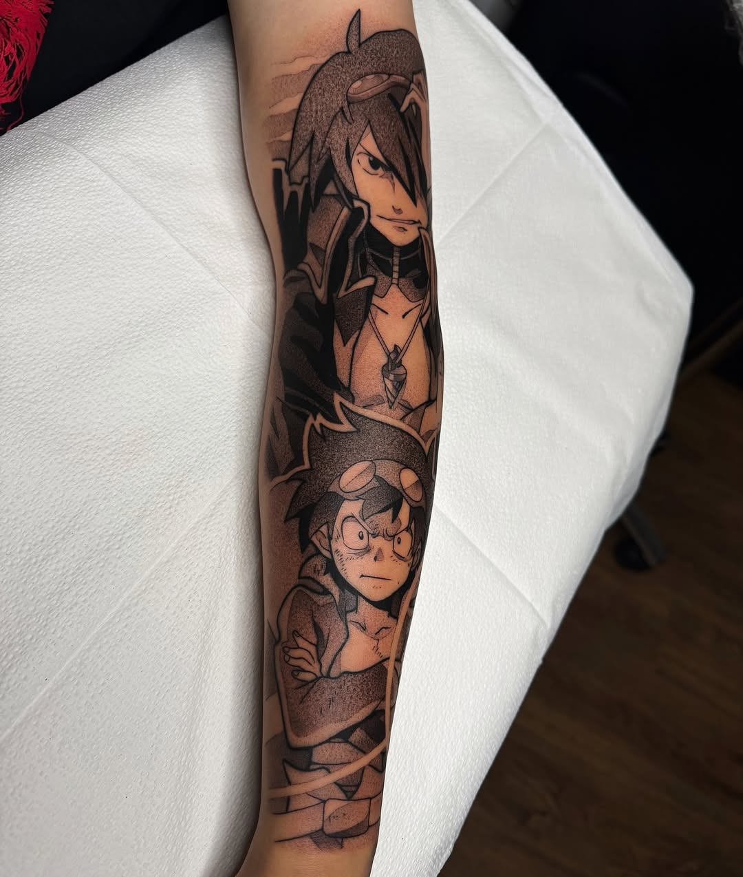 Tattoo by @z__tattoos — anime, black_and_grey