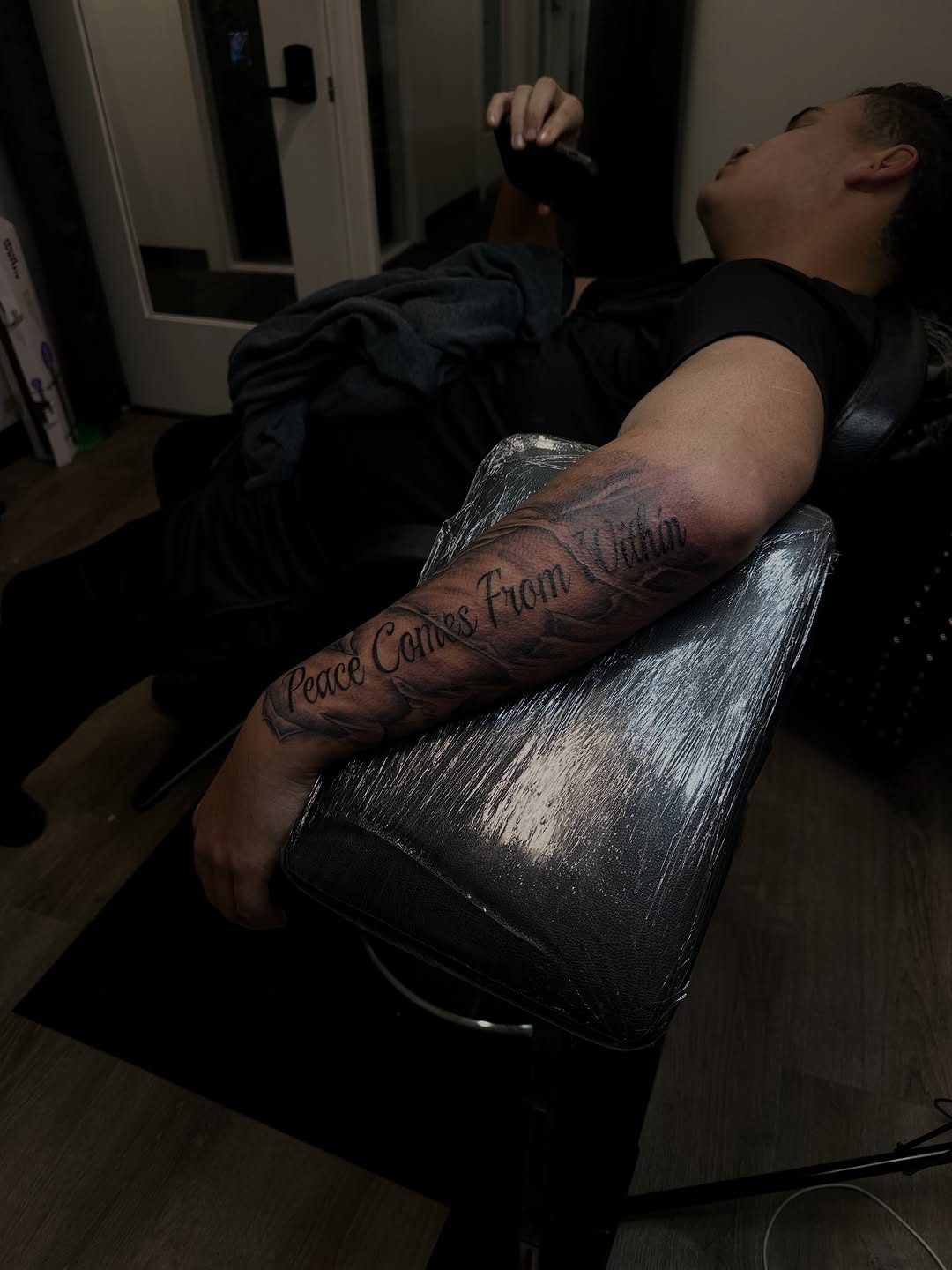 Tattoo by @inkdbyworm — lettering_script, black_and_grey