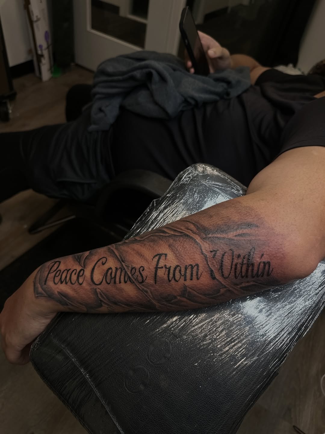 Tattoo by @inkdbyworm — lettering_script, black_and_grey
