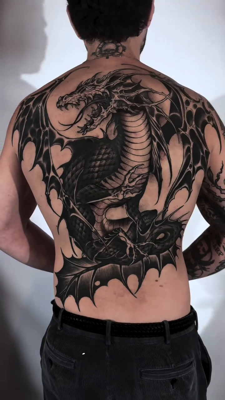 Tattoo by @tattoos.bydahlia โ black_and_grey, realism