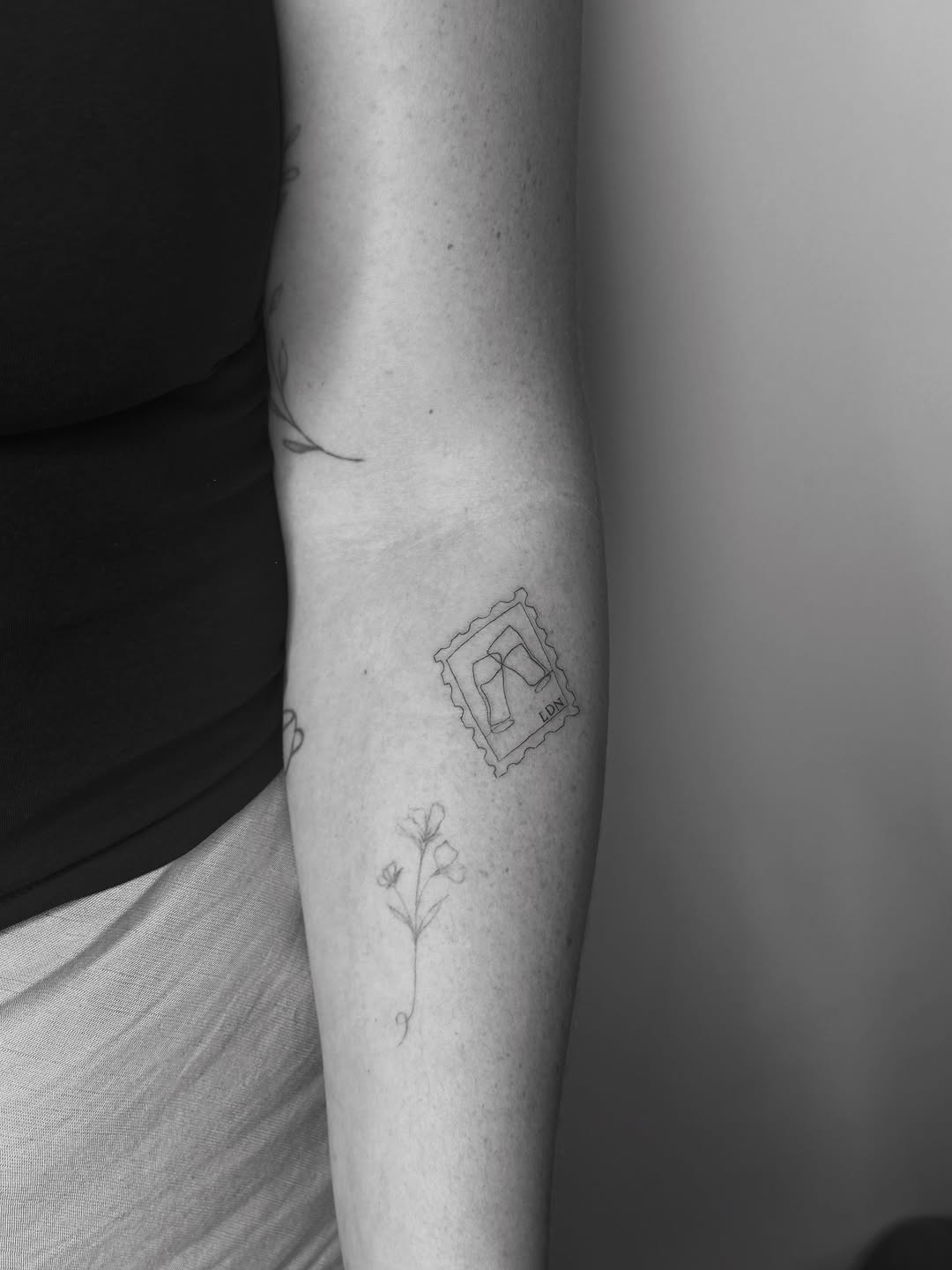 Tattoo by @elliemay.tatts โ fine_line, minimalist
