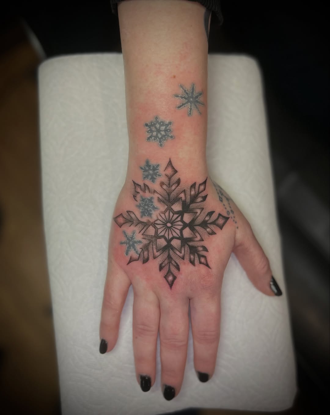 Tattoo by @elyse.ink — geometric, dotwork