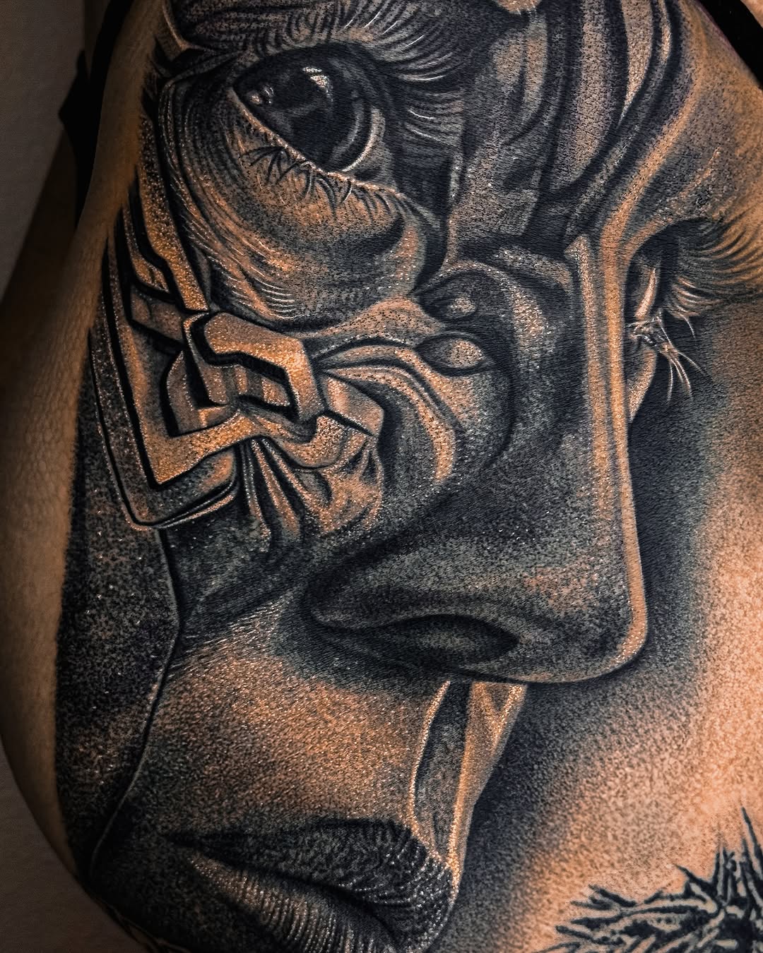 Tattoo by @vegas_tattoo_maksbrand โ realism, black_and_grey