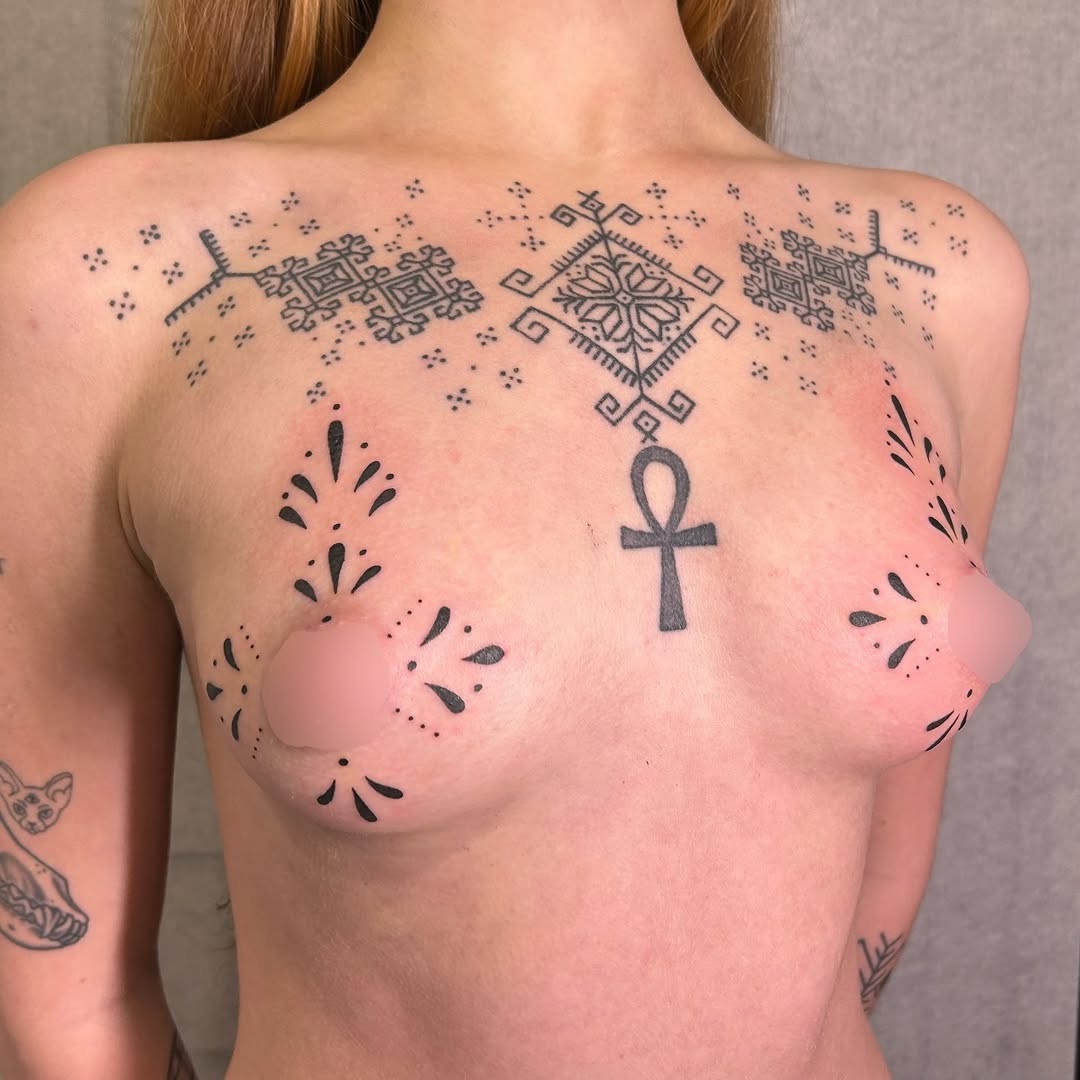 Tattoo by @rubyparkertattoos — geometric, dotwork
