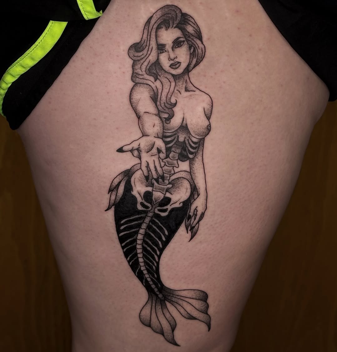 Tattoo by @kyshae.tattoos — blackwork, illustrative