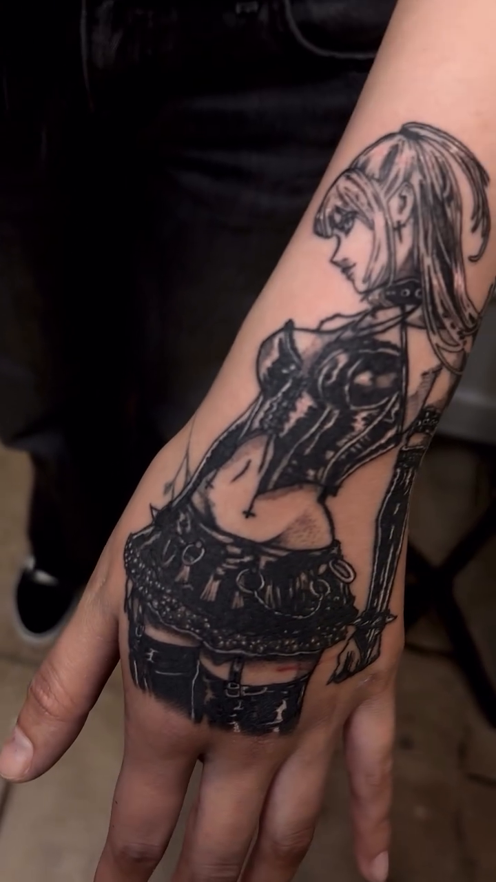 Tattoo by @angieglvz.ink — anime, blackwork