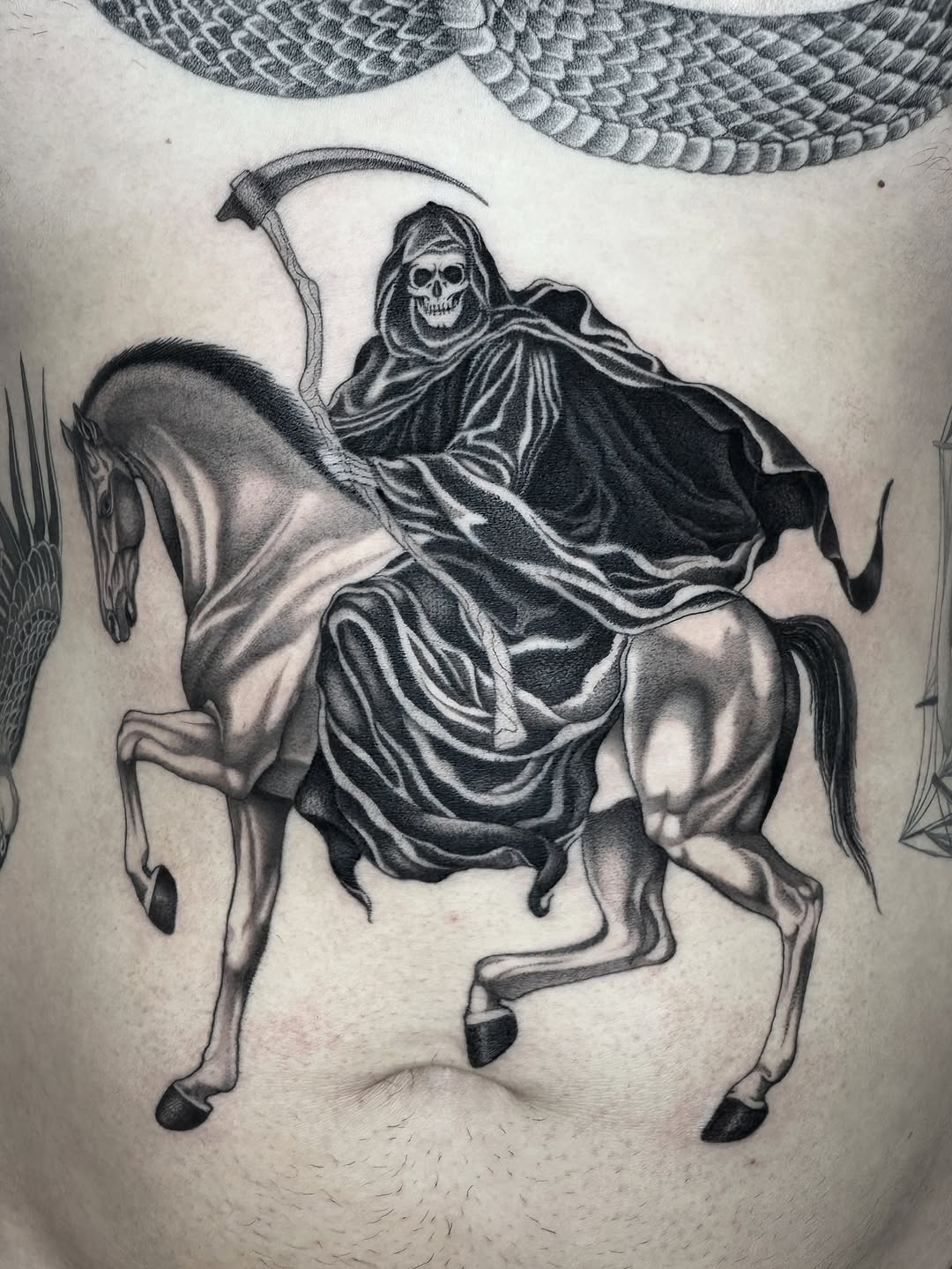 Tattoo by @grit.tattoo — black_and_grey, realism