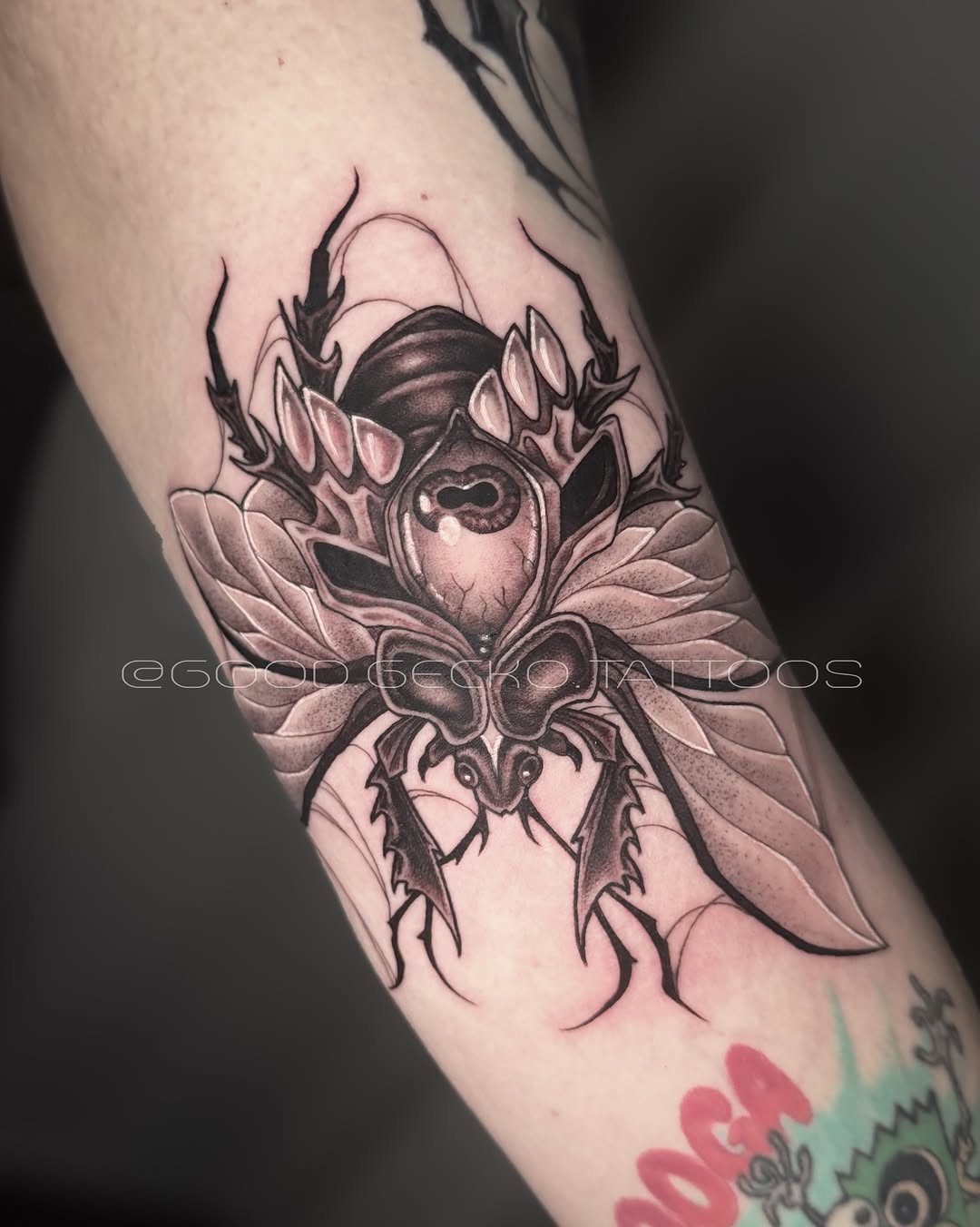 Tattoo by @good.gecko.tattoos — dark_realism, black_and_grey