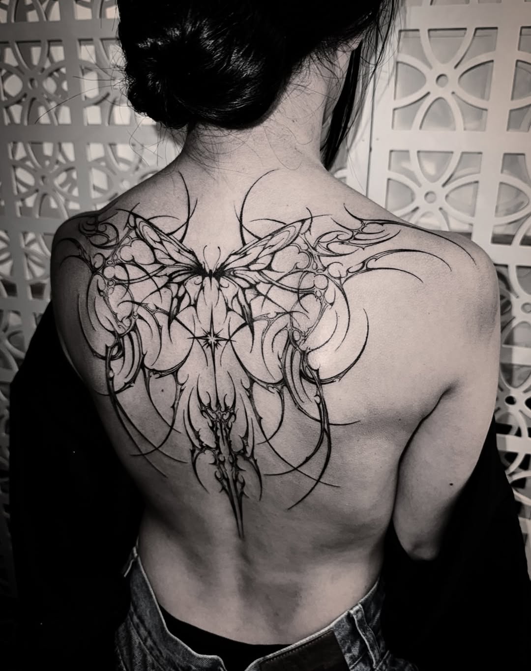Tattoo by @haeng.art — blackwork, ornamental