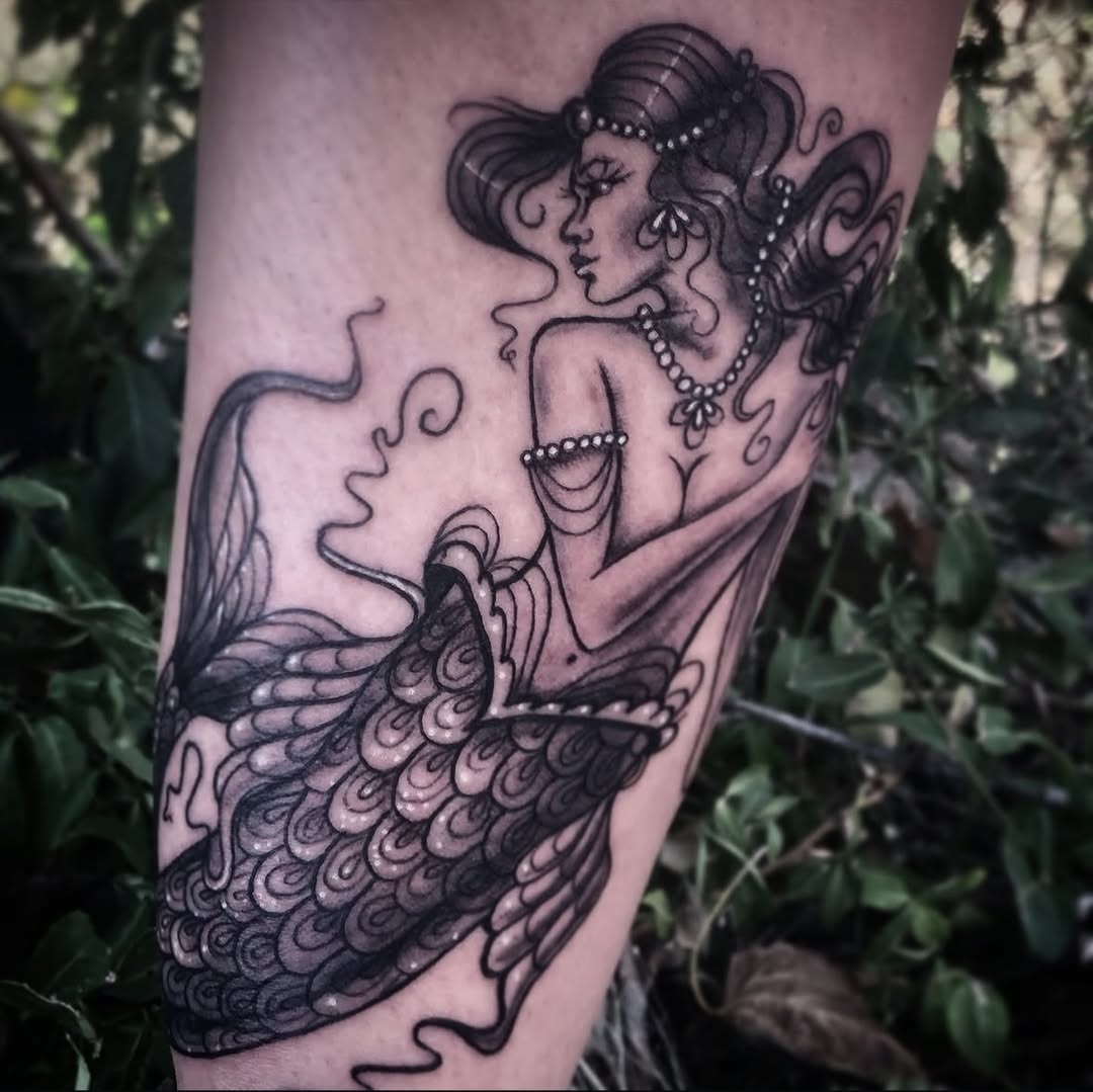 Tattoo by @caitlin.curtis.tattoos — illustrative, black_and_grey