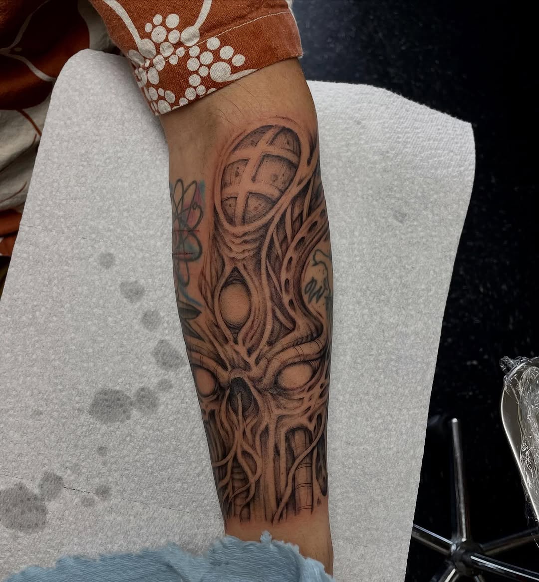 Tattoo by @mharristattoos — dark_realism, black_and_grey