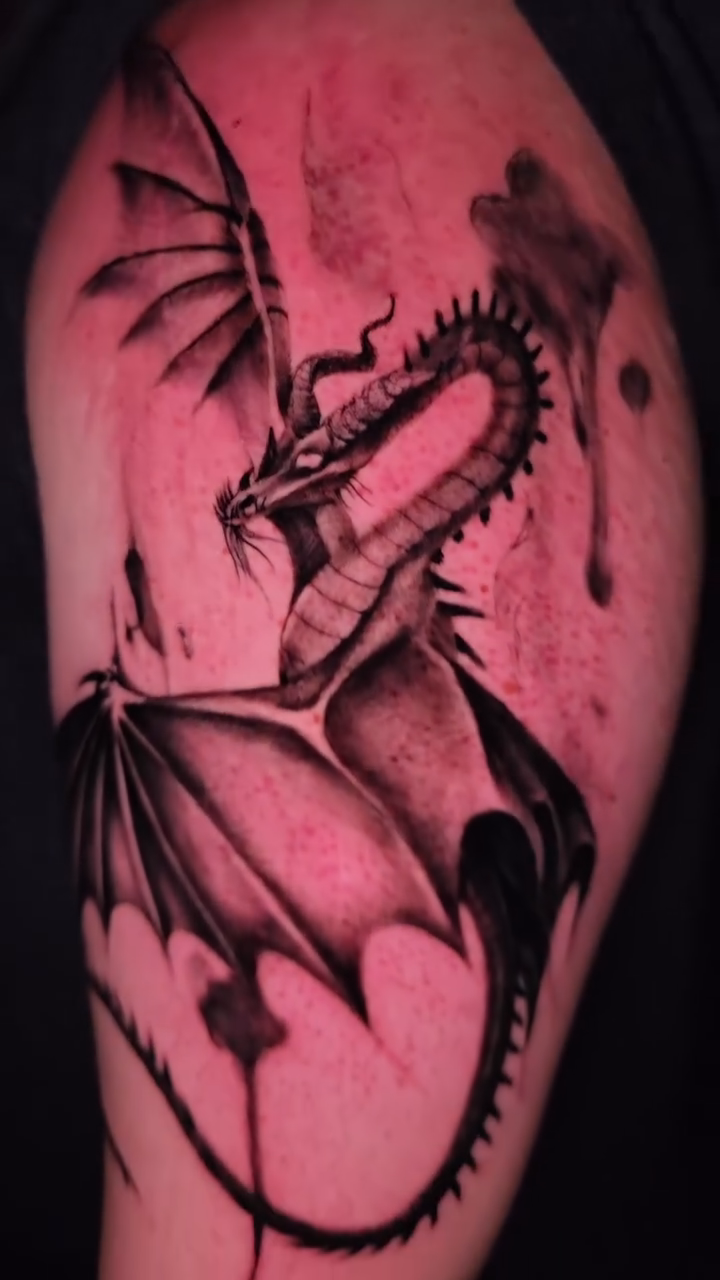 Tattoo by @tanktat2z — dark_realism, black_and_grey