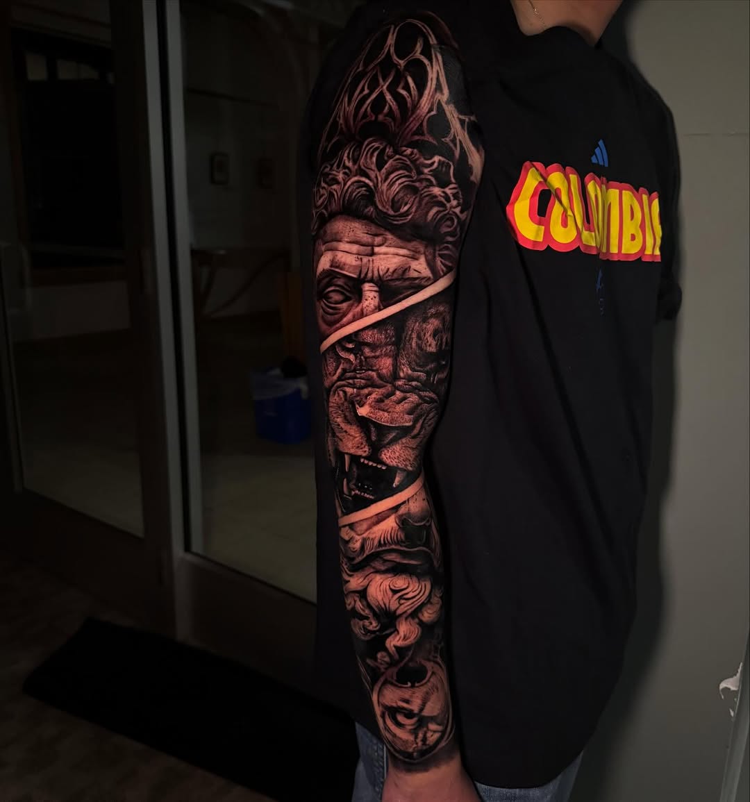 Tattoo by @rex.ink98 — realism, black_and_grey